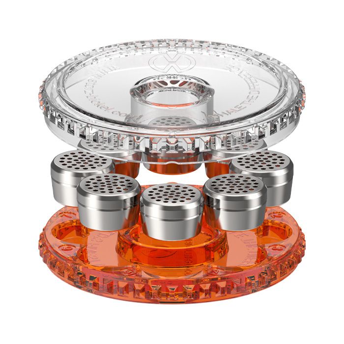 Dosing Capsule Magazine open, with its clear lid raised above the orange base