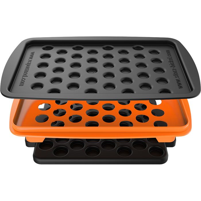 Black cover positioned above the orange filling tray