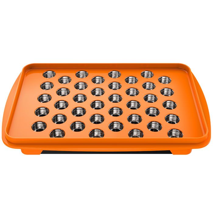 Top view of the orange filling tray holding dosing capsules

