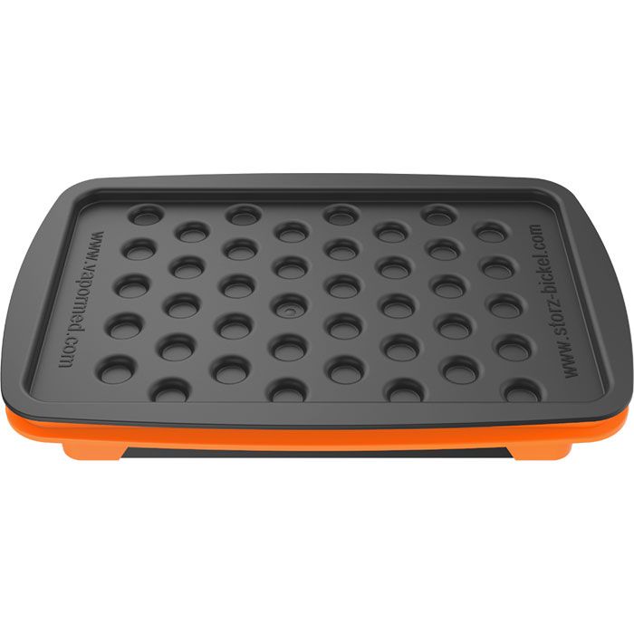 Side view of the black cover resting on the orange filling tray