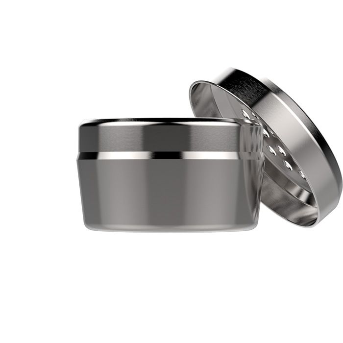 Angled view of an open silver Storz & Bickel dosing capsule with its lid raised